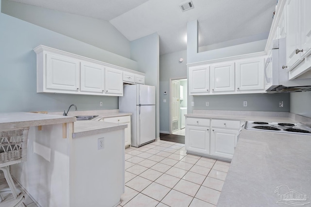 10738 Magnolia Ln, Lillian, AL 36549 - kitchen with white appliances, visible vents, a sink, light countertops, and white cabinetry