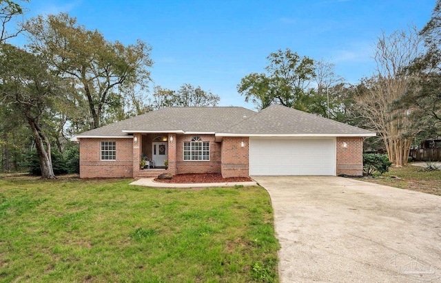 10738 Magnolia Ln, Lillian, AL 36549 - ranch-style house featuring brick siding, concrete driveway, a front yard, and a garage