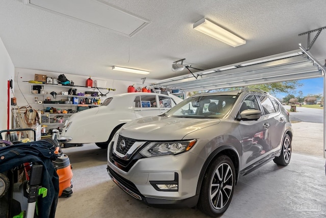 10738 Magnolia Ln, Lillian, AL 36549 - garage featuring a garage door opener