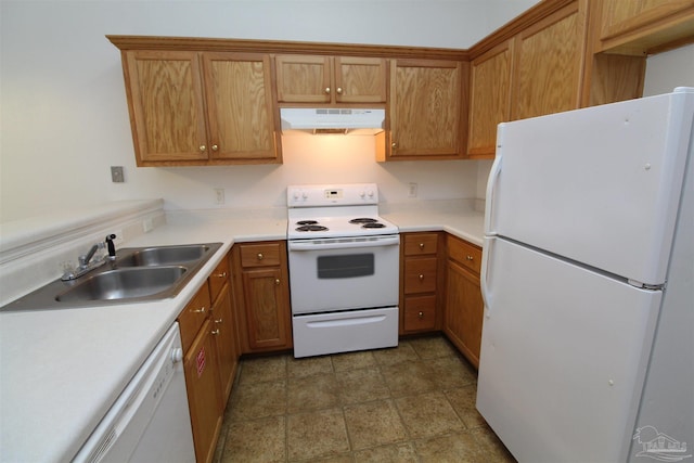 kitchen with white appliances and sink