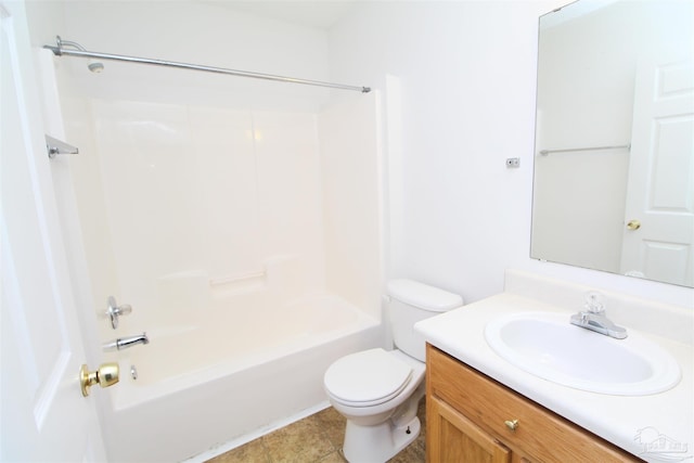 full bathroom with tub / shower combination, vanity, toilet, and tile patterned floors