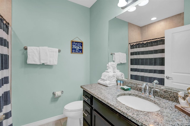 bathroom with vanity, curtained shower, toilet, and tile patterned floors