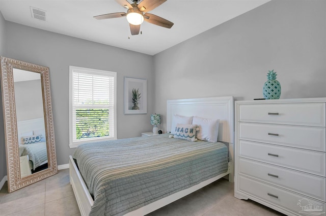 bedroom featuring light tile patterned floors and ceiling fan