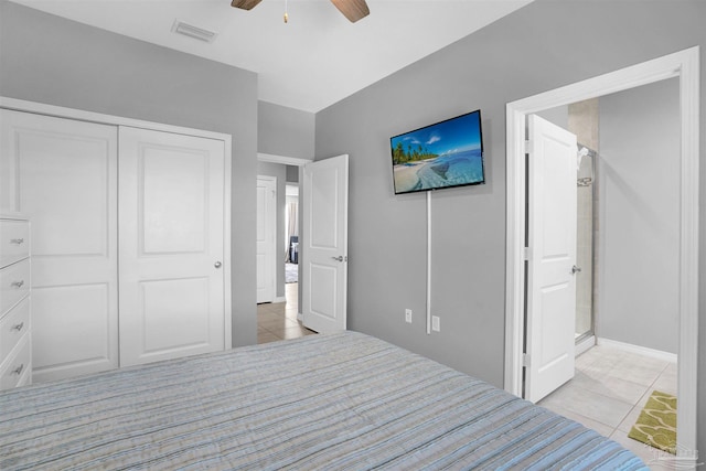 unfurnished bedroom featuring a closet, light tile patterned floors, and ceiling fan