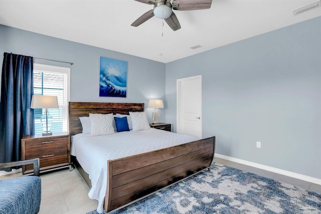 bedroom with light tile patterned flooring and ceiling fan