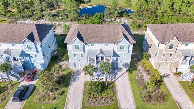 drone / aerial view with a water view