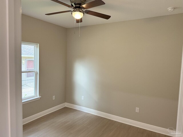 unfurnished bedroom with ceiling fan, light hardwood / wood-style floors, and a closet