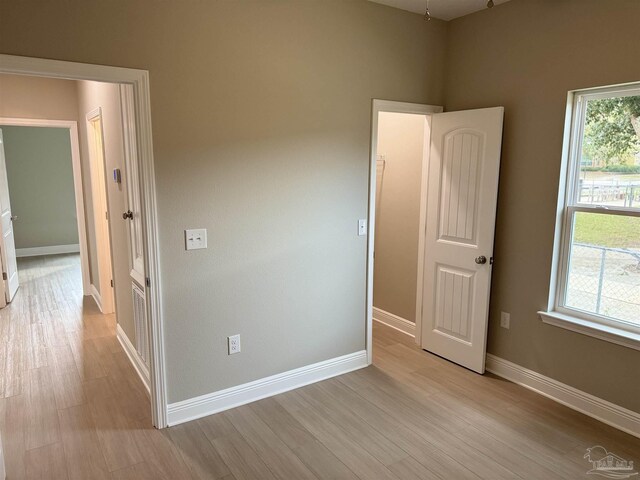 bathroom with vanity, hardwood / wood-style flooring, and toilet