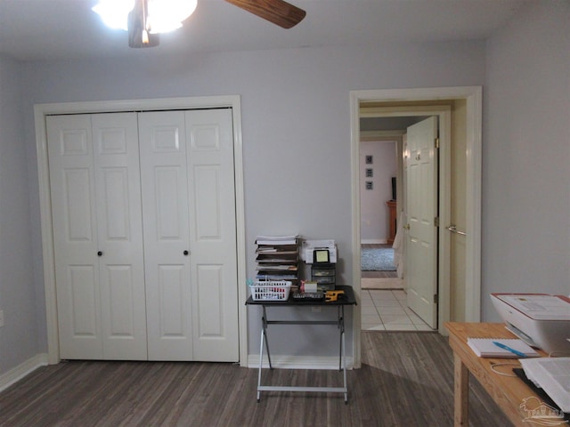 interior space featuring hardwood / wood-style flooring and ceiling fan