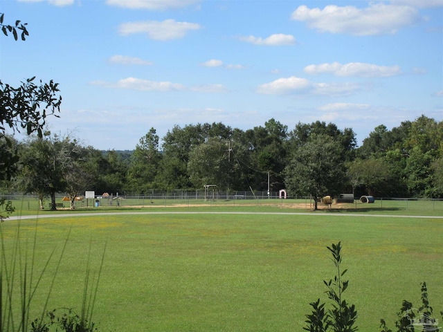 view of home's community featuring a lawn