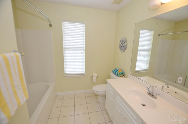 full bathroom featuring a wealth of natural light, vanity, shower / washtub combination, and toilet