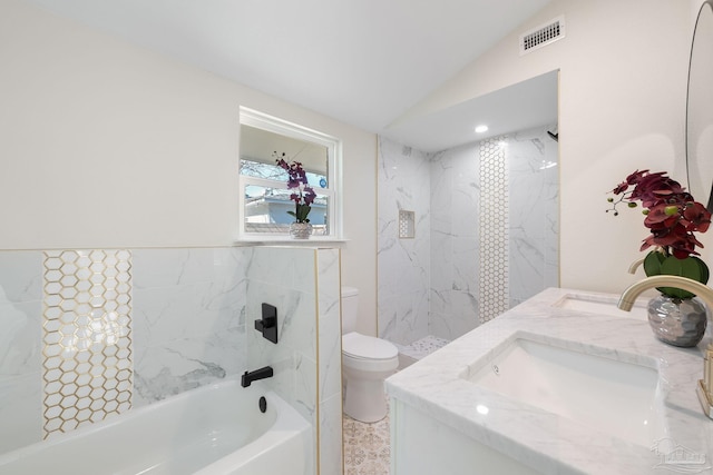 full bath featuring double vanity, lofted ceiling, visible vents, toilet, and a sink