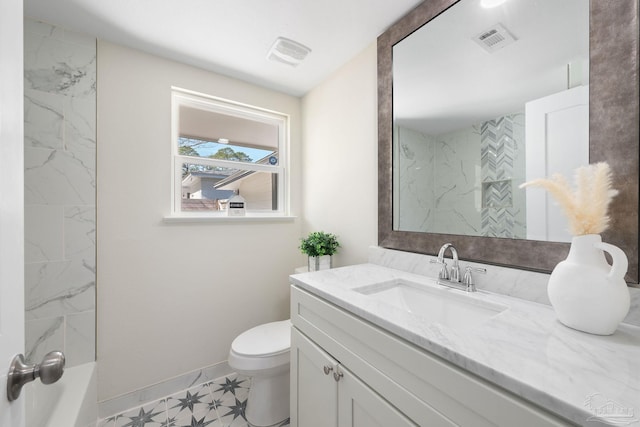 bathroom with visible vents, toilet, vanity, and baseboards