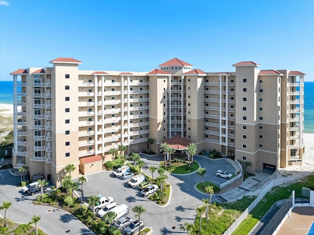 view of building exterior featuring a water view