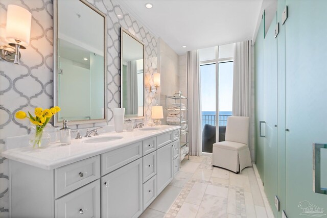 bathroom featuring vanity and a water view