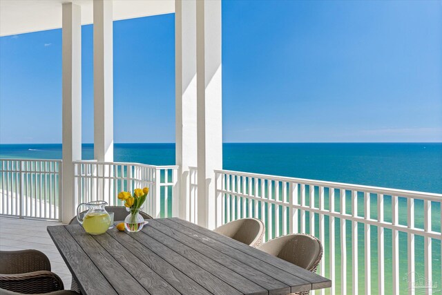 balcony featuring a water view