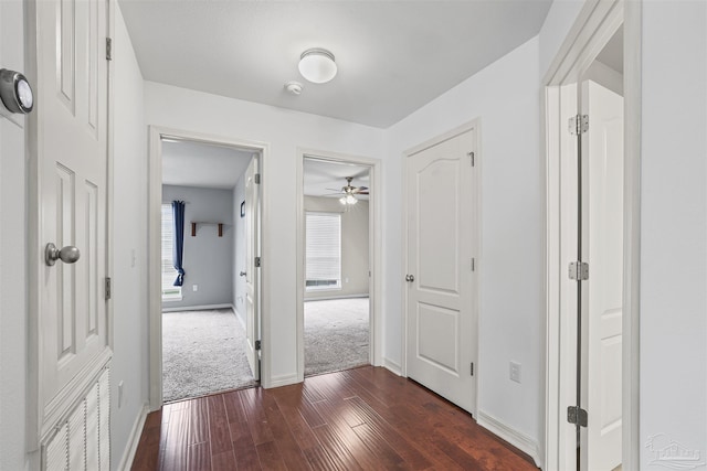 4810 Endeavor Ct, Milton, FL 32570 - hall featuring dark wood-type flooring and baseboards
