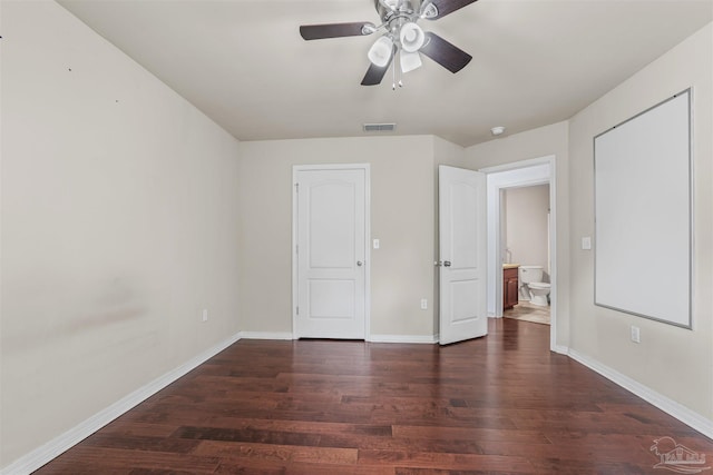 4810 Endeavor Ct, Milton, FL 32570 - unfurnished bedroom with wood finished floors, baseboards, and a ceiling fan