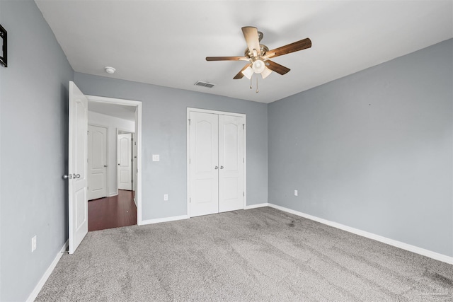 4810 Endeavor Ct, Milton, FL 32570 - unfurnished bedroom with carpet floors, baseboards, a closet, and ceiling fan