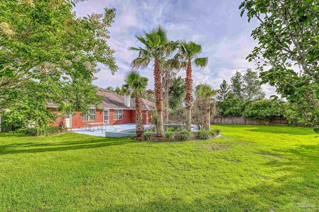 4810 Endeavor Ct, Milton, FL 32570 - view of yard featuring a patio