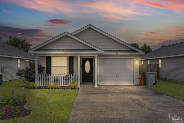 5576 Shadow Shore Pl, Gulf Breeze, FL 32563 - ranch-style home featuring covered porch, a garage, and driveway