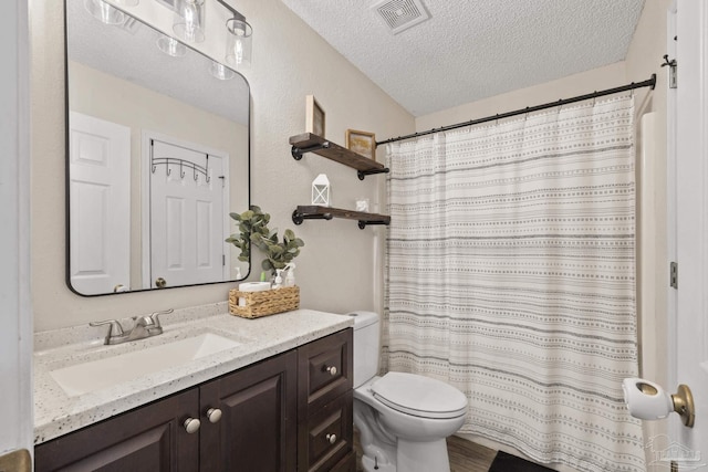5576 Shadow Shore Pl, Gulf Breeze, FL 32563 - full bathroom featuring a textured ceiling, vanity, and a shower with curtain