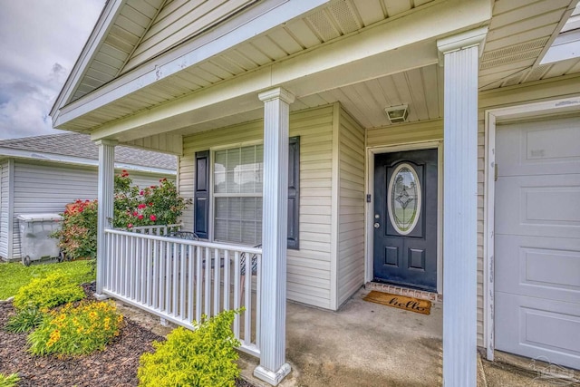 5576 Shadow Shore Pl, Gulf Breeze, FL 32563 - entrance to property with a porch