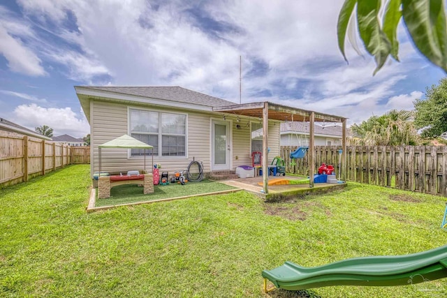 5576 Shadow Shore Pl, Gulf Breeze, FL 32563 - back of house featuring a fenced backyard and a patio area