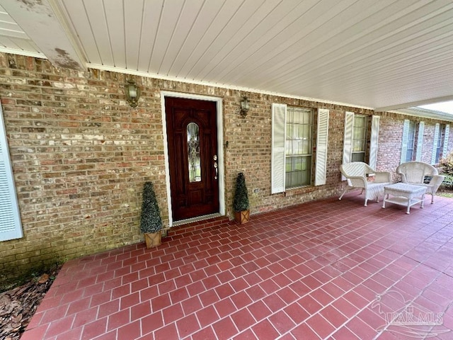 property entrance with a porch