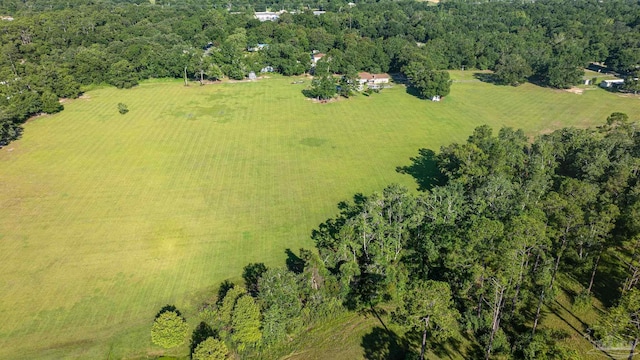 birds eye view of property featuring a rural view