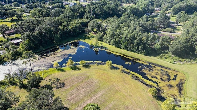 birds eye view of property featuring a water view and a rural view