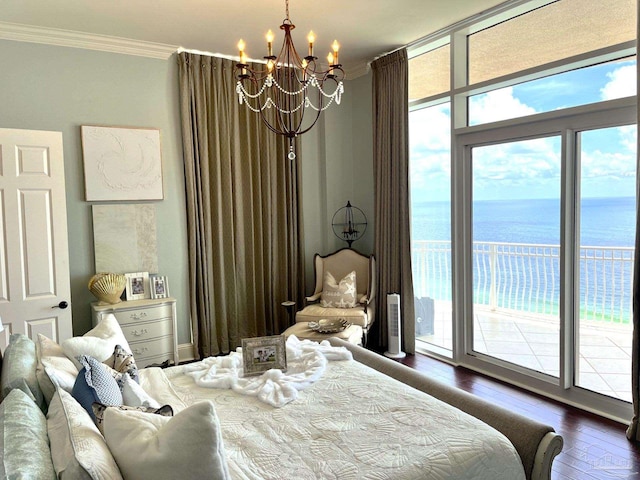 bedroom with hardwood / wood-style flooring, a chandelier, a water view, crown molding, and access to exterior