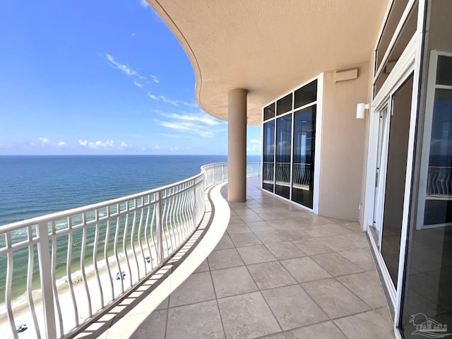 balcony featuring a water view