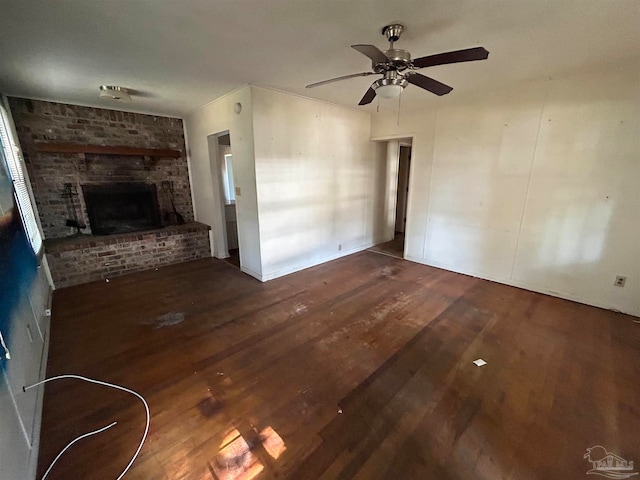 unfurnished living room featuring a fireplace, ceiling fan, and hardwood / wood-style floors