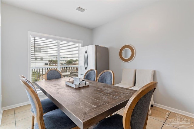 view of tiled dining space