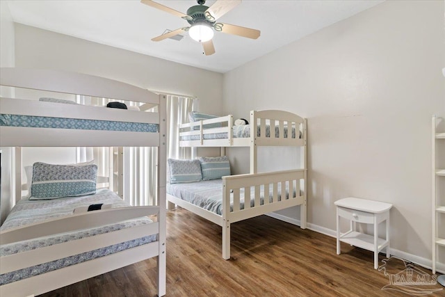 bedroom featuring hardwood / wood-style flooring and ceiling fan