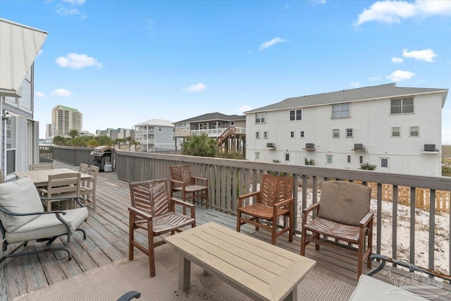 wooden terrace with grilling area