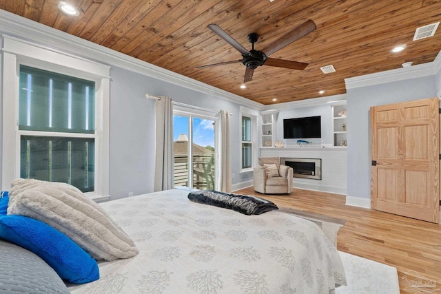 bedroom with ceiling fan, ornamental molding, wood ceiling, and hardwood / wood-style flooring