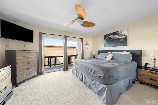 carpeted bedroom featuring ceiling fan and access to exterior