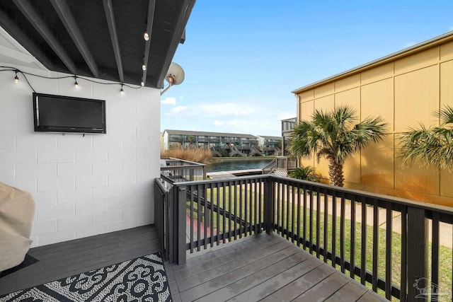 deck featuring a water view