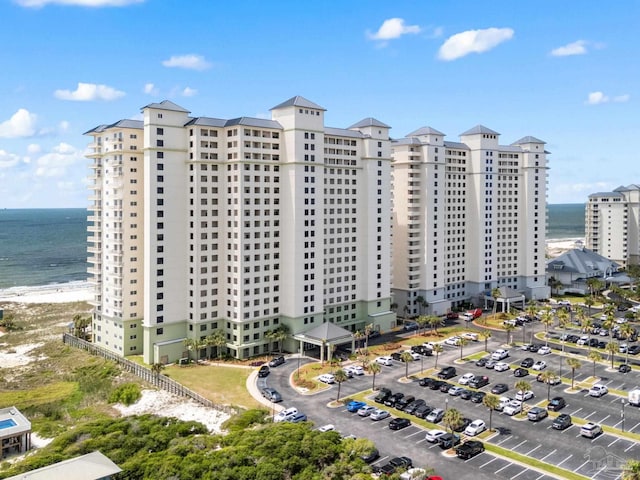 375 Beach Club Trl Unit A1801, Gulf Shores, AL 36542 - view of building exterior featuring a water view and uncovered parking