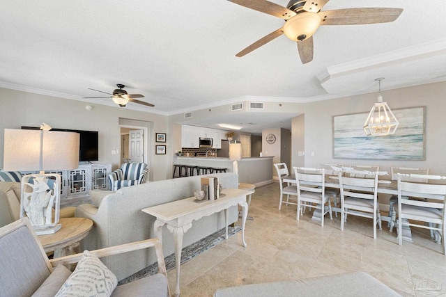 375 Beach Club Trl Unit A1801, Gulf Shores, AL 36542 - living room with a ceiling fan, crown molding, a textured ceiling, and a chandelier
