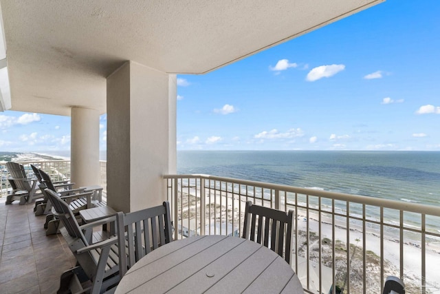 375 Beach Club Trl Unit A1801, Gulf Shores, AL 36542 - balcony with view of water and beach and outdoor dining space