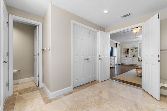 375 Beach Club Trl Unit A1801, Gulf Shores, AL 36542 - corridor with baseboards, recessed lighting, and built in shelves