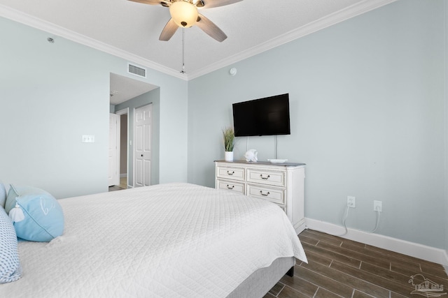 375 Beach Club Trl Unit A1801, Gulf Shores, AL 36542 - bedroom with dark wood finished floors, baseboards, crown molding, and a ceiling fan