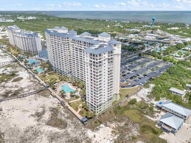 375 Beach Club Trl Unit A1801, Gulf Shores, AL 36542 - aerial view of a pool area, a nearby body of water, and apartment complex