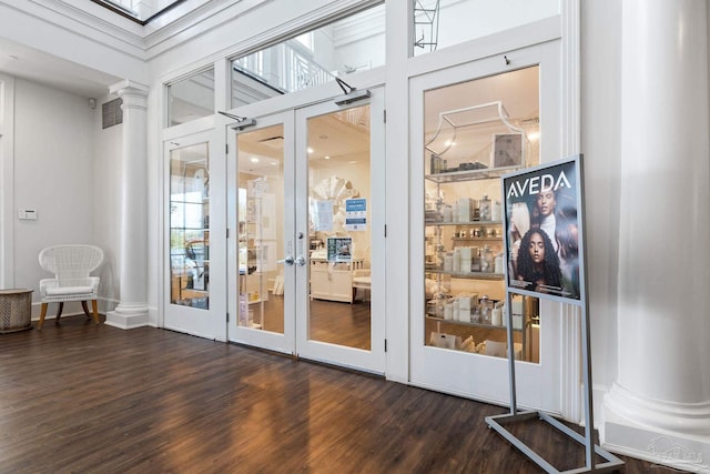 375 Beach Club Trl Unit A1801, Gulf Shores, AL 36542 - doorway with decorative columns, french doors, wood finished floors, and a towering ceiling