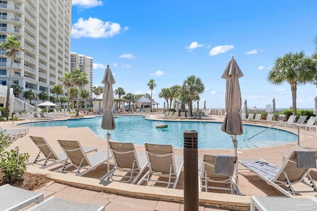 375 Beach Club Trl Unit A1801, Gulf Shores, AL 36542 - community pool featuring a patio area