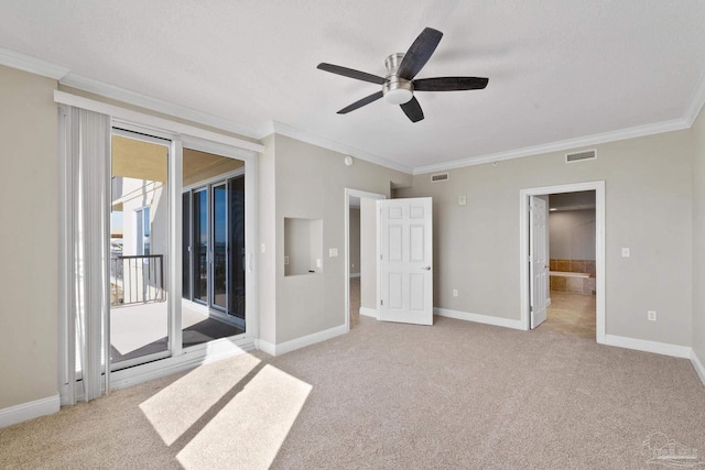 unfurnished bedroom featuring crown molding, ceiling fan, access to exterior, connected bathroom, and light colored carpet