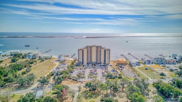 birds eye view of property featuring a water view